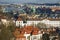 View of the city and city streets, architecture and roofs houses from above. Prague