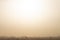 View on the city of Giza in a morning with smog and sunrise, outskirts of Cairo, as seen from the Giza Plateau