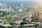 View of the city from a height, railway station and freight wagons and trains.