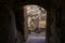 View of the city of Matera Italy through an empty tunnel