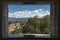 View of the city through one of the windows / embrasures of the Castle of Ljubljana, Slovenia