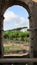 View of the city opening from one of the arches of the Colosseum