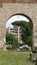 View of the city opening from one of the arches of ruins, Rome.