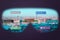View of the city panorama with VR glasses. The interface shows the locations of restaurants, hotels, shops, museums
