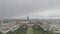 View of the city of Paris, France from top of Eiffel Tower on a cloudy day
