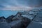 View on city and pier from rocky headland