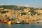 View on the city and the port of Genoa on the sunset.