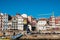 View of the city of Porto from the banks of the Douro river, facades, terraces and Port