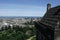 View of city from the ramparts of Edinburgh castle Princes Street gardens show green in the foreground