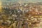 View of the city from the top. Moscow from the observation deck. Houses, streets and roads of the city. The railway divides the
