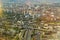 View of the city from the top. Moscow from the observation deck. Houses, streets and roads of the city. The railway divides the