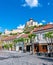 View of city Trencin, Slovakia. Beautiful town square with panoramic view to ancient Castle on the hill. Summer day with blue sky