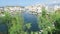 View at the Cityscape of Agios Nikolaos Crete Greece. Boats at small volcano lake voulismeni and its harbor. Traditional houses