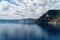 View of Cleetwood Cove and majestic mountains at Crater Lake National Park, US