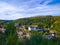 View of Clervaux and mountains with the Abbey of St. Maurice and St. Maurus of Clervaux Clervaux Abbey and the Clervaux Castle