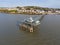 View of Clevedon Pier and Heritage Trust situated on shoreline in bright and sunny weather