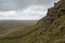 A view of a cliff edge from the side of Pen-y-ghent