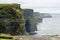 View on Cliff of Moher, county Clare, Ireland. Epic landscape with magnificent scenery. Irish landmark and popular tourist