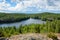 A view from the cliff over forest and lake in Finland.