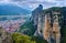 View from cliff top over Kalambaka and Kastraki villages at foot of Meteora mountains, Greece, and famous impressive