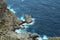 View from the cliff on the waves breaking on the shore. Cape Formentor. Majorca. Spain