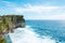 View of the cliff with waves in the sea from The Hindu Temple Pura Luhur Uluwatu