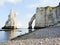 View of cliffs with arch on english channel beach