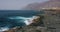 View of the cliffs of Los Gigantes Tenerife from coastline, Atlantic Ocean.