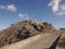 View of a closed and abandoned military base on the mountain of the Prophet Elijah, Santorini island Greece.