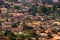 View of closely packed houses on a hillside in Nyamirambo, a sem