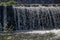 View closeup of waterfall part at cascade of river Bistritsa between village  Bistritsa and village Pancharevo, place for tourism