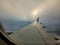 View of cloud from window of passing by aero plane