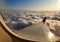 View of cloud from window of passing by aero plane