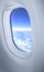 View of clouds through the aircraft porthole