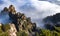 View of the clouds and the pine tree at the mountain peaks of Huangshan National park, China. Landscape of Mount Huangshan of the