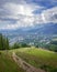 View of the cloudy mountains. In the valley the city of Zakopane