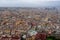 view of the cluster of buildings in Naples through the top of Castel Sant'Elmo, Italy.