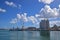 View of coast guard vessel and factory building from Caudan Waterfront, Port Louis, Mauritius