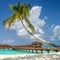 View of the coast of irufushi island, water bungalows, maldives