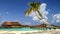 view of the coast of irufushi island with water bungalows, maldives