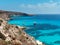 View of the coast of Lampedusa island sicily italy paradise sea yacht rabbits beach