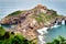 View from the coast on the rock in the ocean with a chapel Doniene Gaztelugatxeko