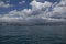 View of the coast from the sea with clouds