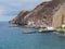 view of coastal cliffs and marina at village Puerto de Sardina del Norte at Grand Canaria, Canary islands, Spain