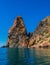 View on coastal cliffs, rock Orest and Pilad, cape Fiolent in Balaklava, Sevastopol Crimea. Bright sunny day, calm cristal clear