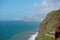 View of the coastline of CaniÃ§o, Madeira with Funchal city on the background