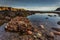 View of the coastline with cliff and beach at Castle Haven, Stonehaven, Aberdeenshire, Scotland, United Kingdom