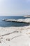 view of coastline and landmark big white chalk rock at Governor\\\'s beach,Limassol, Cyprus. Steep stone cliffs and deep blue