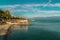 View of the coastline. Massandra beach, Yalta, Crimea. Metal frames shelters from the sun