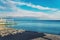 View of the coastline. Massandra beach, Yalta, Crimea. Metal frames shelters from the sun